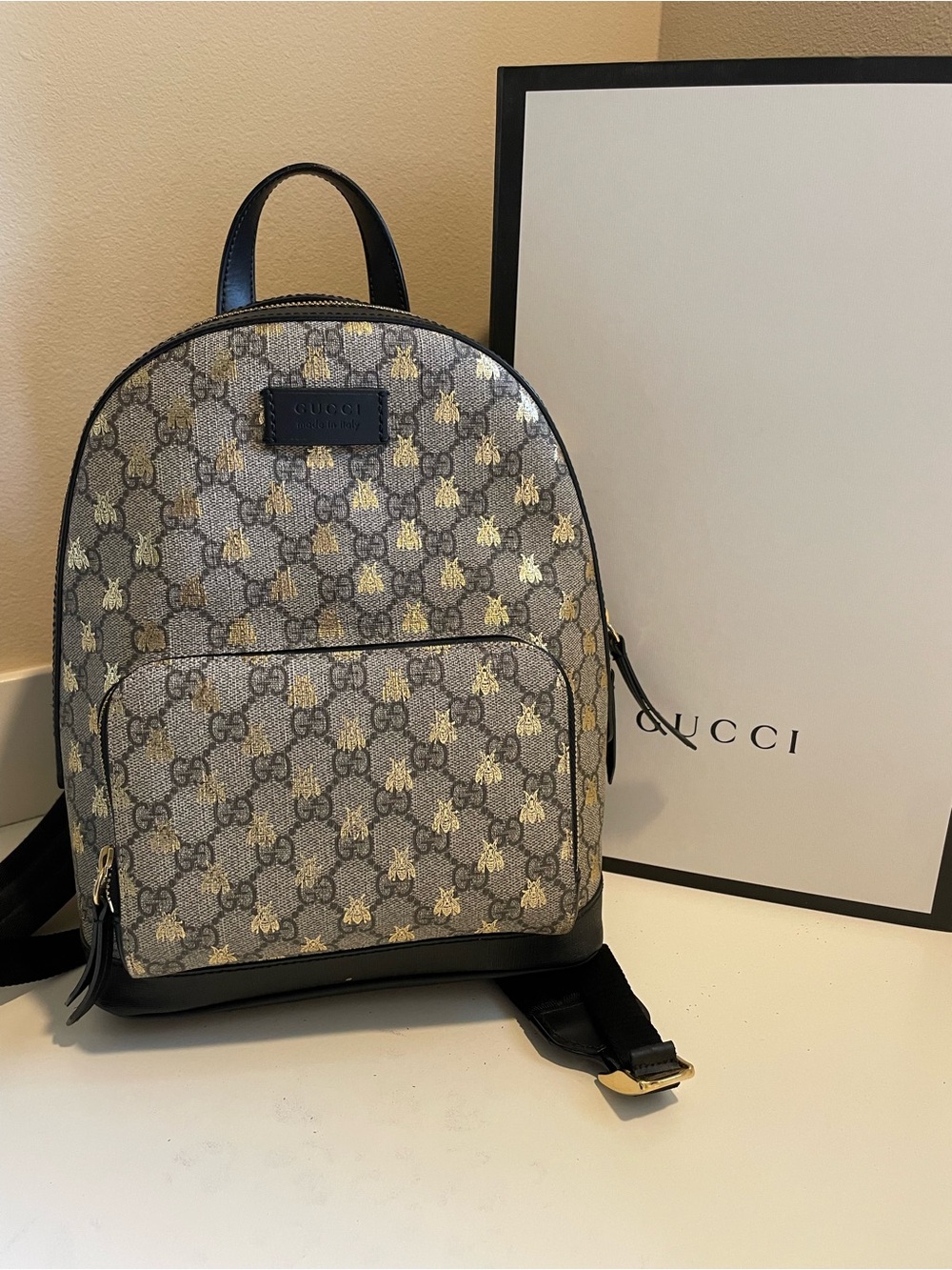 Gucci Gray GG Supreme Backpack with Gold Bee Print